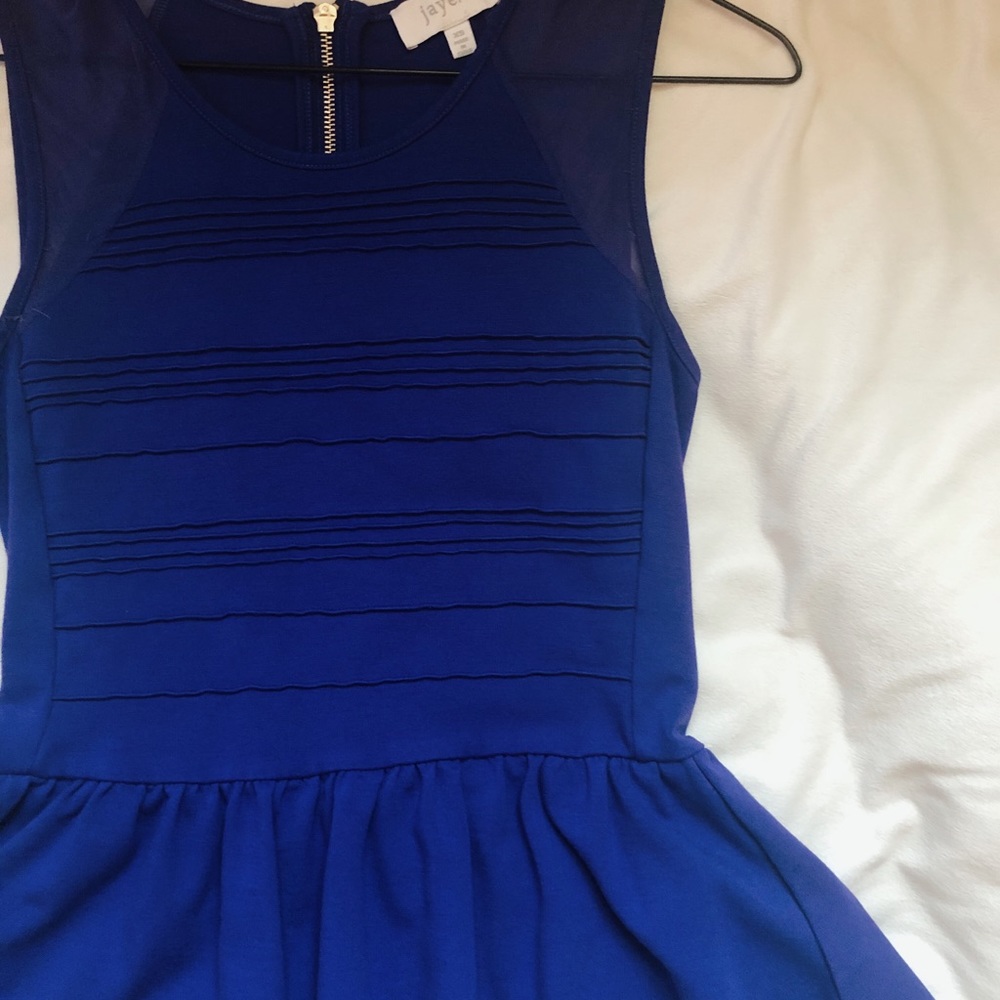 Peplum Sleeveless Top